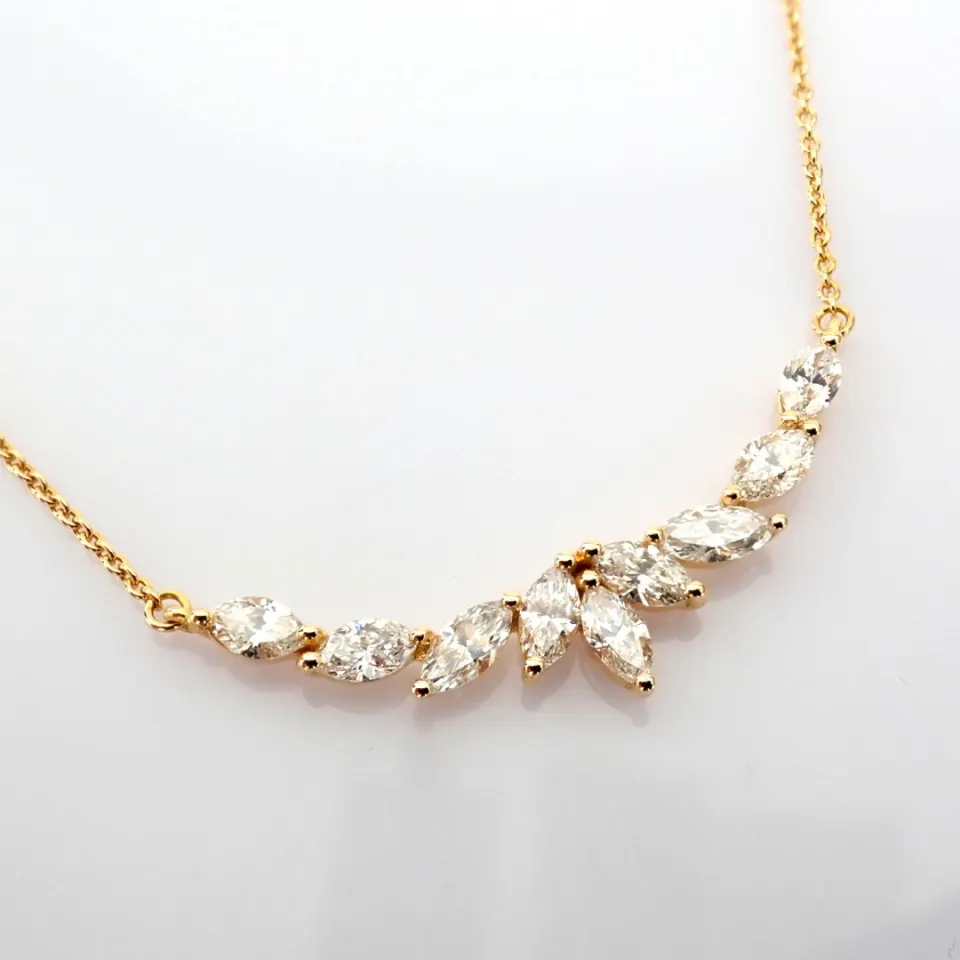 An Exquisite Necklace Detailed With Brilliant Diamonds and Gold
