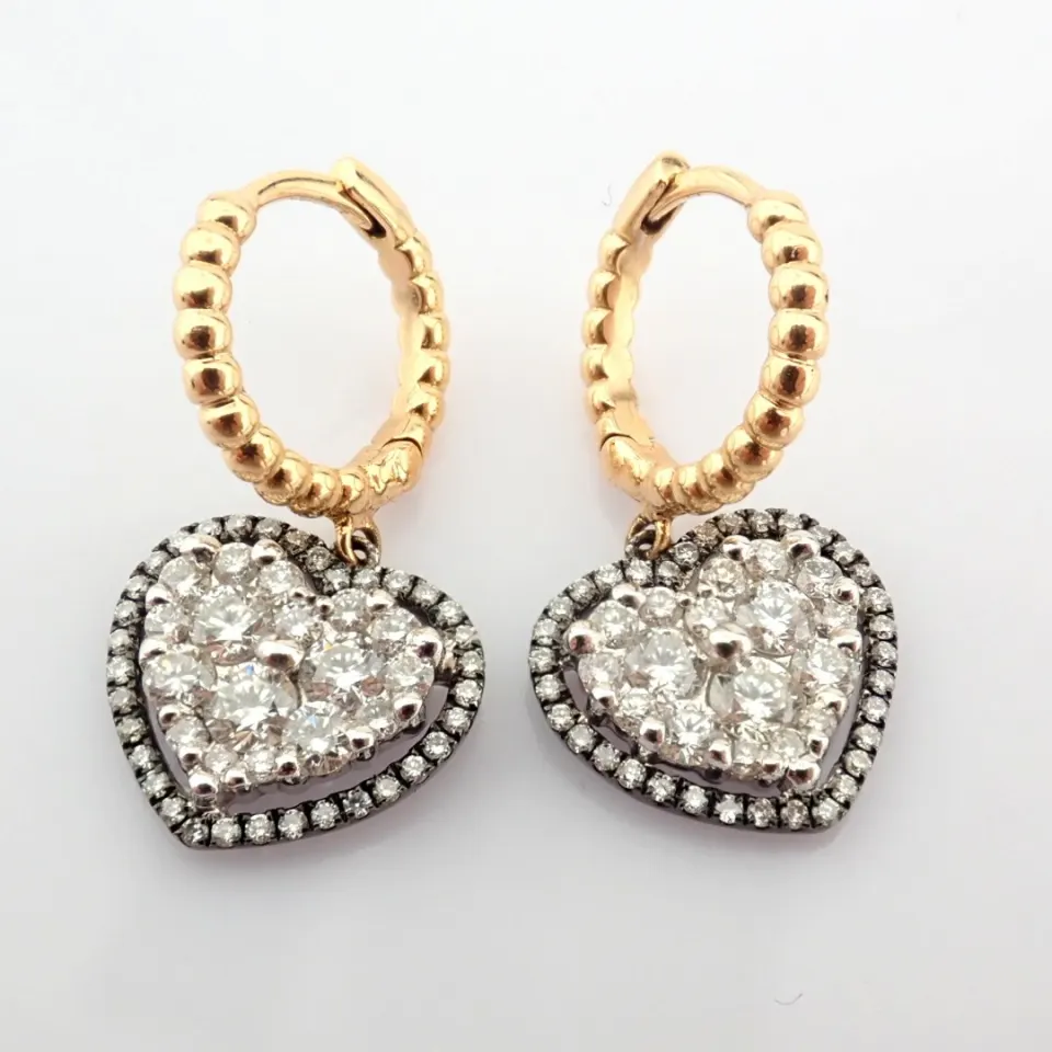 18K Yellow and White Gold Heart Earrings Detailed With Brilliant Diamonds