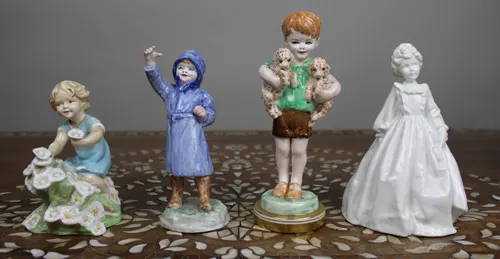 Collection of 4 Royal Worcester Figurines