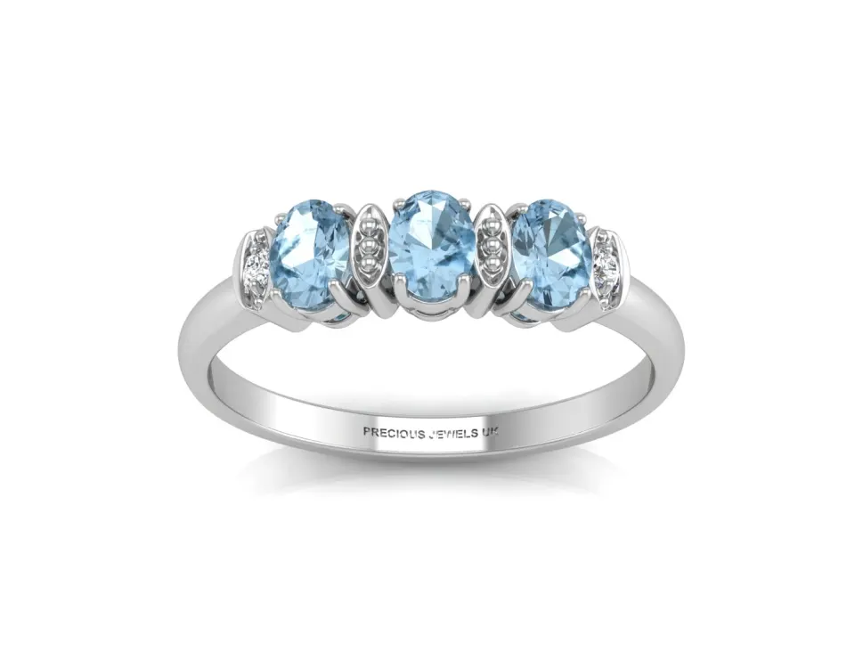 9ct White Gold Semi Eternity Diamond And Blue Topaz Ring (BT0.63) 0.01 Carats