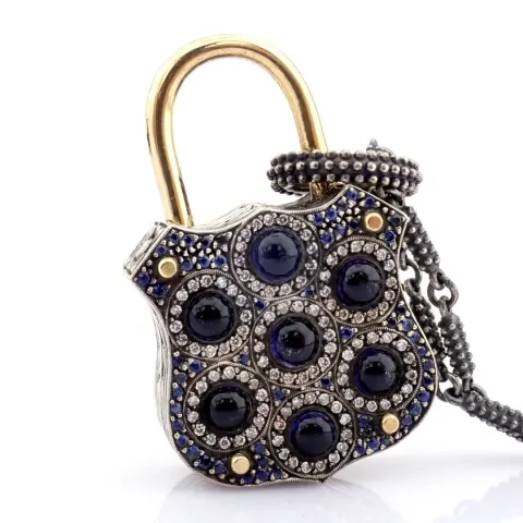 Convertible clasp necklace embellished with gold, colorful stones, and diamonds on silver
