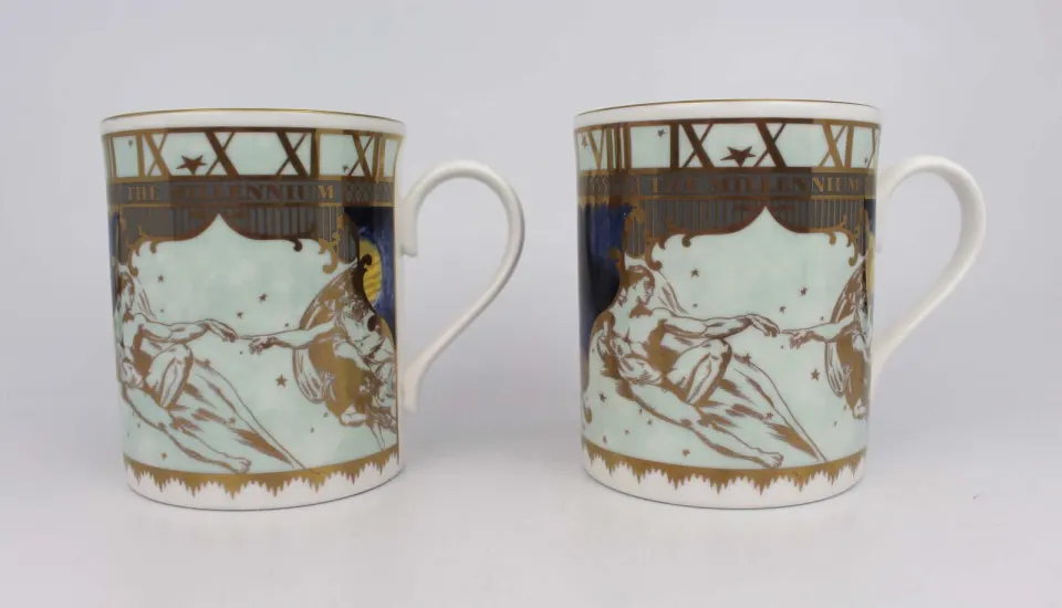 Pair of Royal Worcester Millennium Tankards