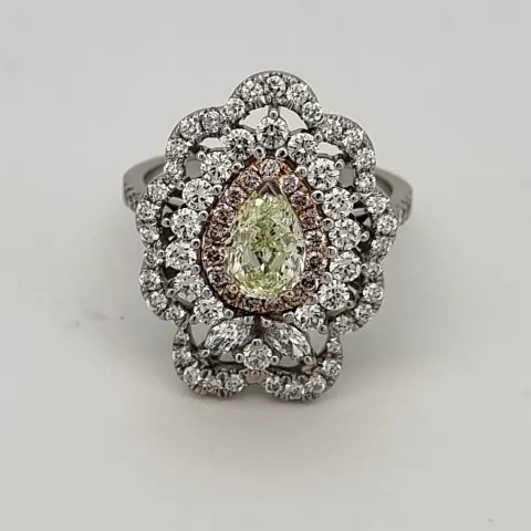 1.03 ct fancy light yellow green pear shape gia certificate vvs2 strong green and white coll diamond
