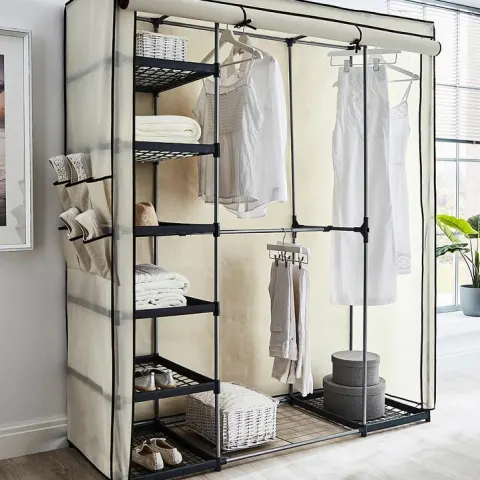 (123/Mez) RRP £79. Covered Triple Wardrobe With Storage Cream. Dimensions: (H175x W147x D54cm).