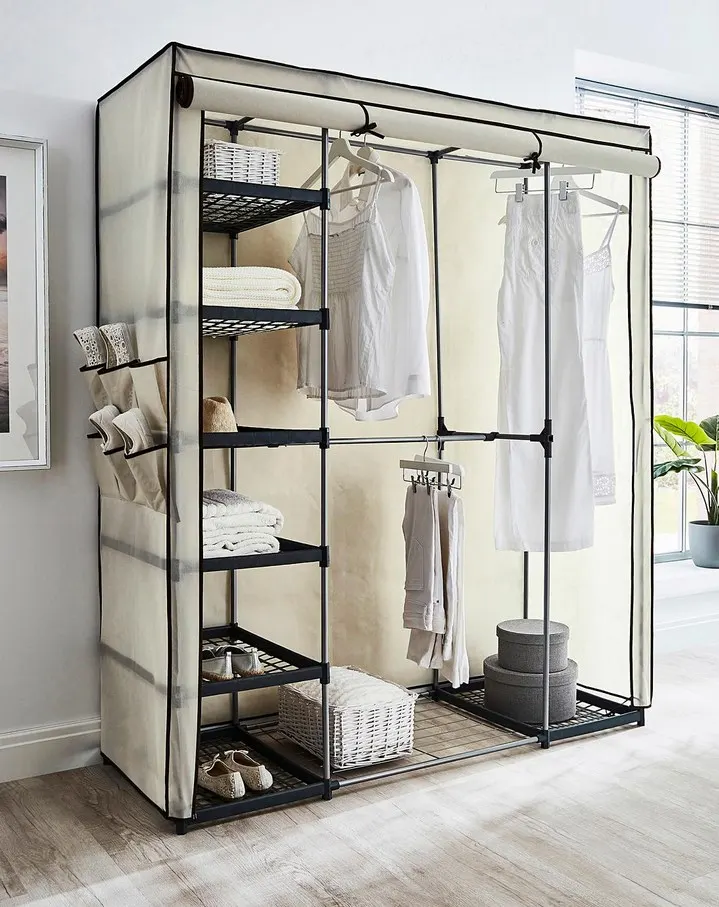 (123/Mez) RRP £79. Covered Triple Wardrobe With Storage Cream. Dimensions: (H175x W147x D54cm).