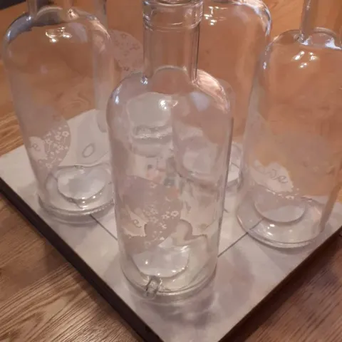 4 Boxes of 6 Bottle Vases With The Word "Love" On In White