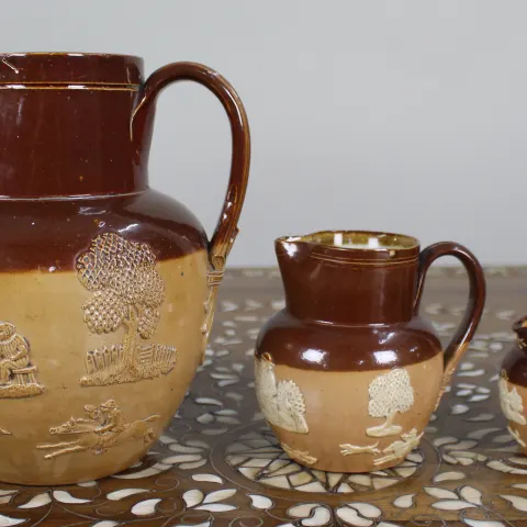 Collection of Three Graduated Doulton Lambeth Stoneware Jugs, c.1900