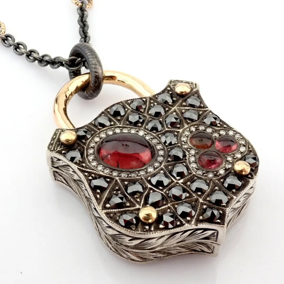 Convertible clasp necklace embellished with gold, colorful stones, and diamonds on silver