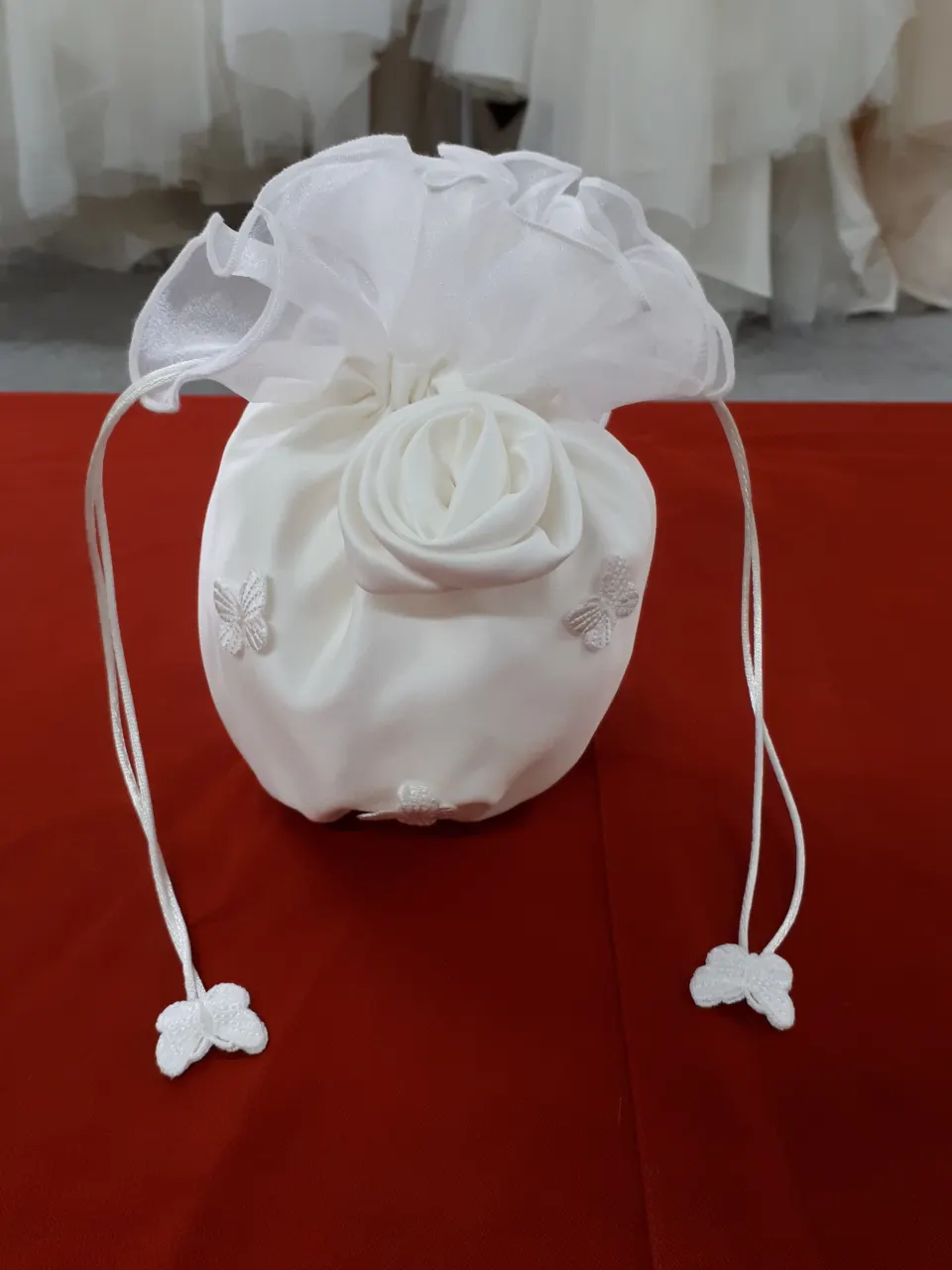 Satin butterfly bag in ivory.