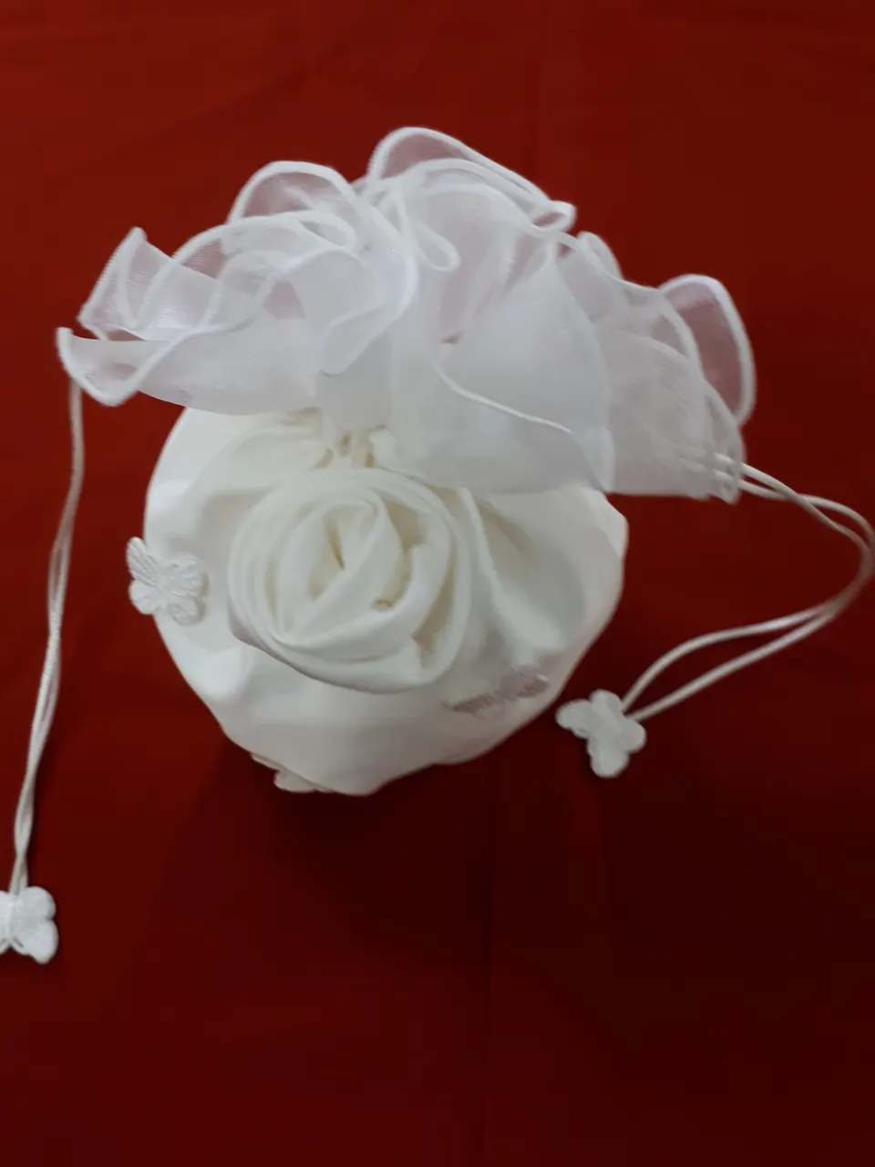 Satin butterfly bag in ivory.