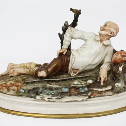 Vintage Capodimonte Sculpture Reclining Old Man & Bird