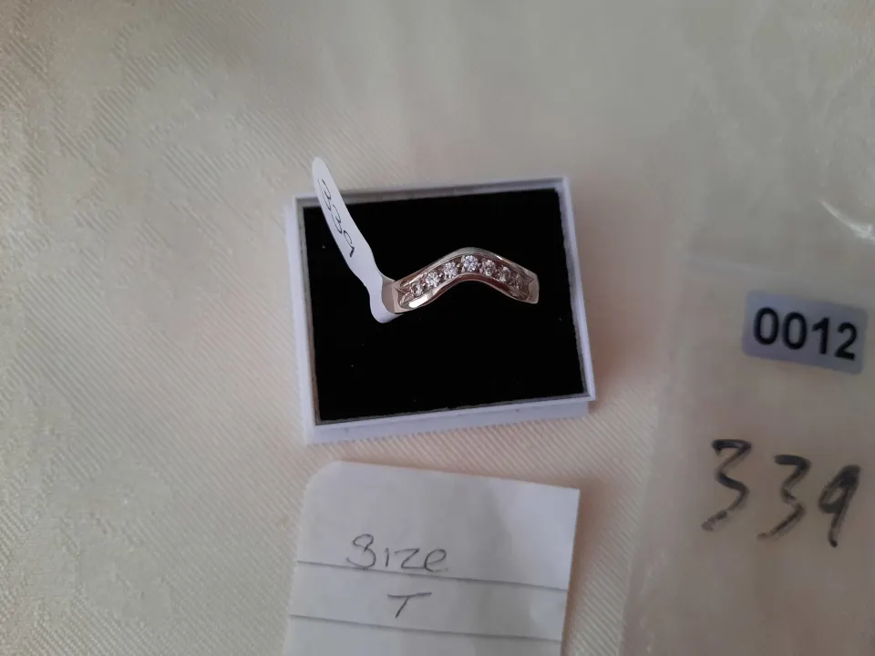 Rhodium plated set high quality CZ ring.  Size T. Code 339/0012