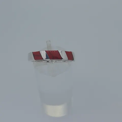 Silver ring set with reconstituted coral