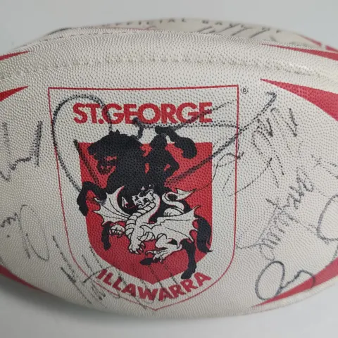 A fully signed St George Illawarra Dragons rugby ball from Australia.