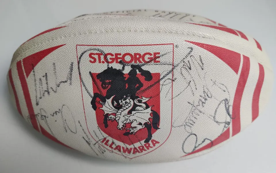 A fully signed St George Illawarra Dragons rugby ball from Australia.