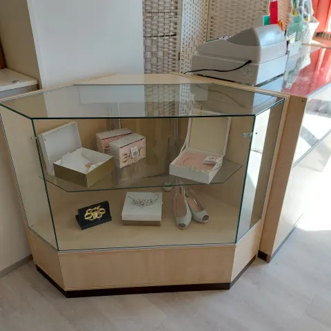 Corner display unit.  Maple and glass