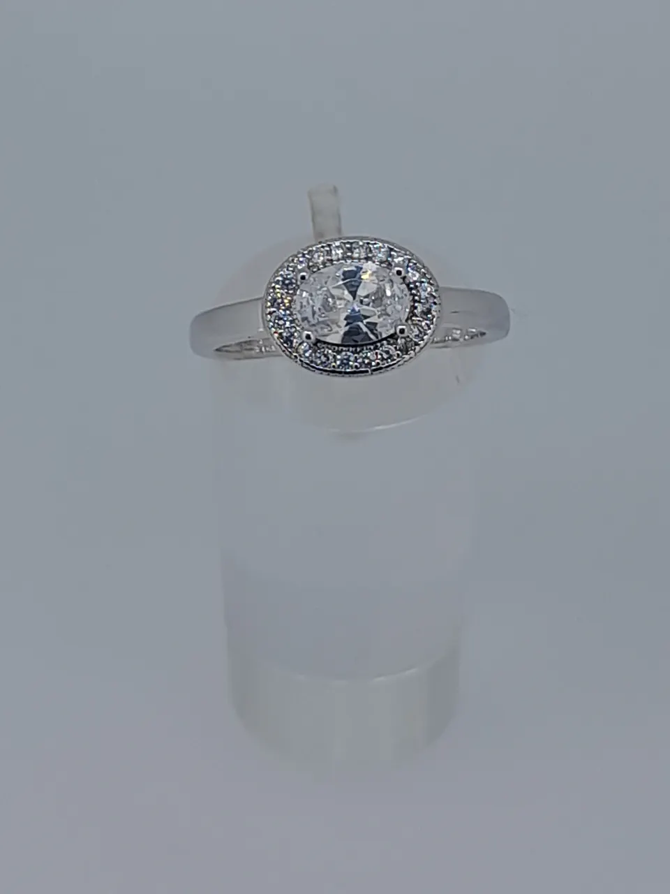 Silver Stamped 925 Dress Ring Set With CZ Stone, Centres Tone Measures 5.94 mm Diameter. Finger Siz