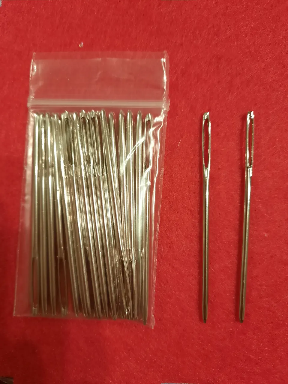 100 large tapestry needles and bag of small tapestry needles