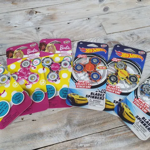 6 x Collectors Fidget Spinners. 3 x Barbie design and 3 x Hot Wheels design. Rrp £52