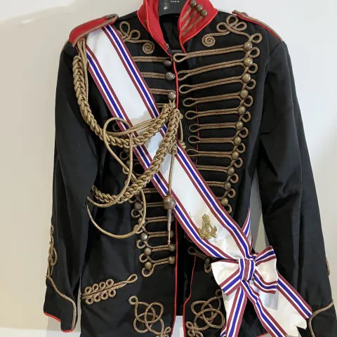 Black military jacket with sash