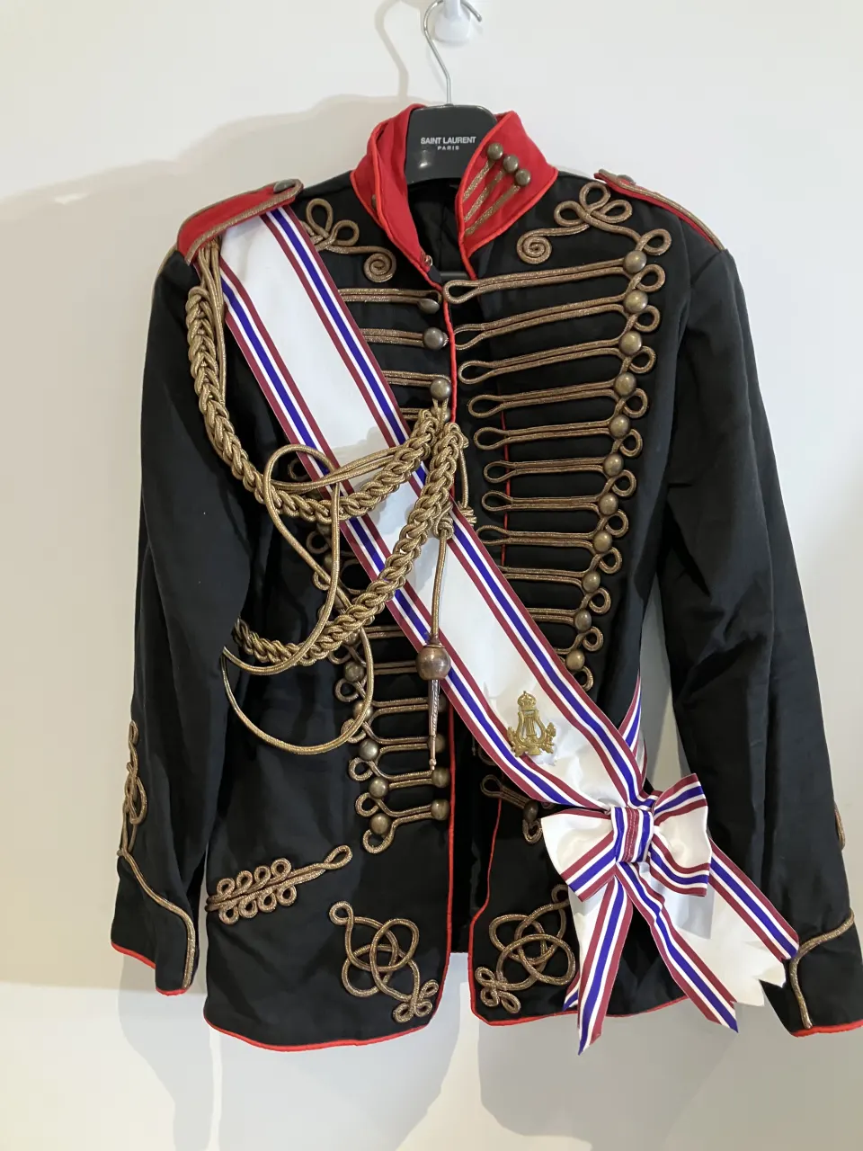 Black military jacket with sash