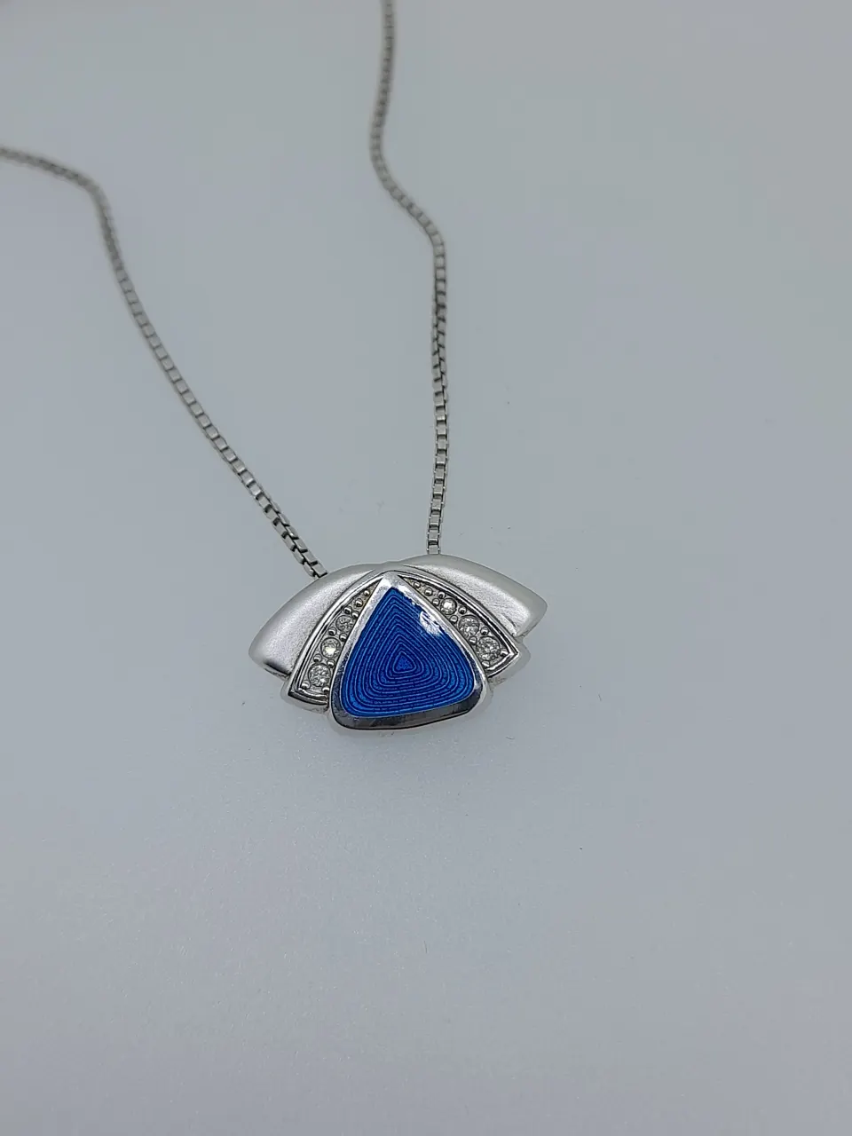 Silver Enamelled Pendant Set With Round Cut Sapphires