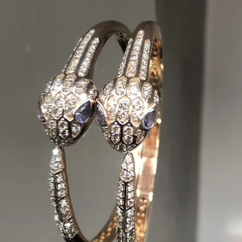 Beautiful Natural Diamond and Tanzanite snake bracelet with 18k rose gold