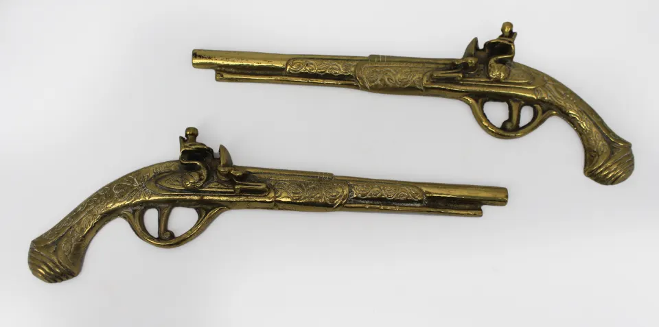 Pair of Decorative Brass Firearms