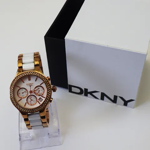 A Rose Gold Plated Ceramic DKNY Watch Original Box and Papers