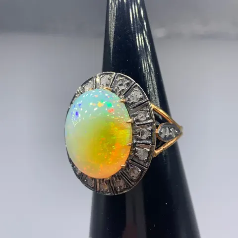 Large and weighty cabochon Ethiopian opal and rose-cut diamond cocktail ring