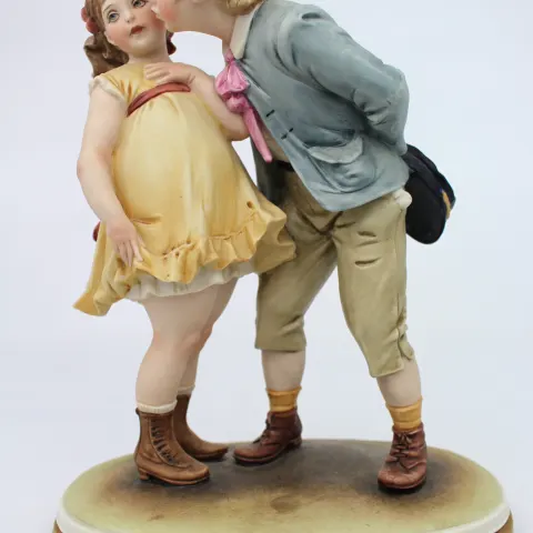 Capodimonte Figurine Boy Kissing Girl by Bruno Merli