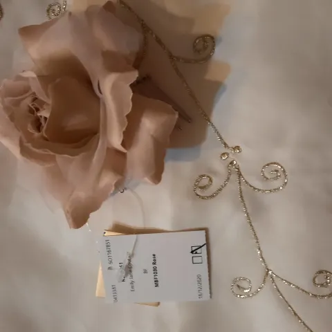 Hairpiece/fascinator in rose pink
