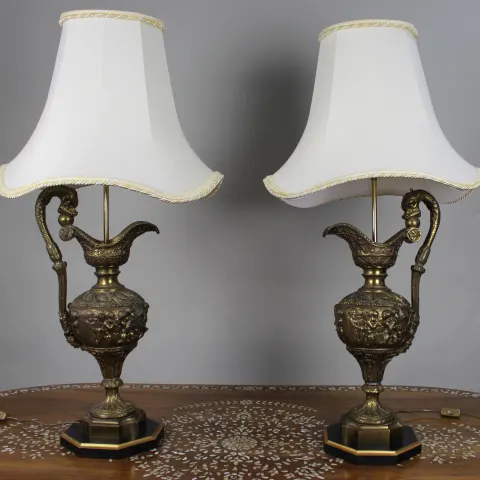 Pair of Early 20th Century French Neoclassical Ewer Lamps with Putti Relief