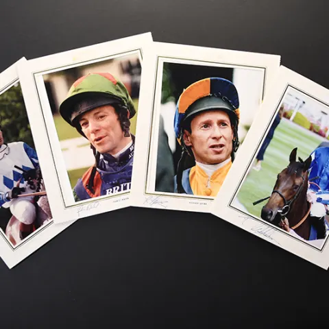 Horse racing photos bearing original signatures.