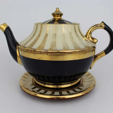 Decorative Lustre Terractotta Tea Pot on Stand