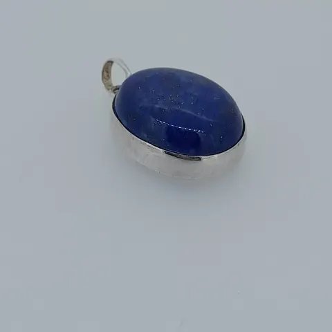 Silver set with lapsus lazuli stone