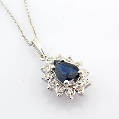 18K white gold cluster necklace  detailed with sapphire and brilliant diamonds