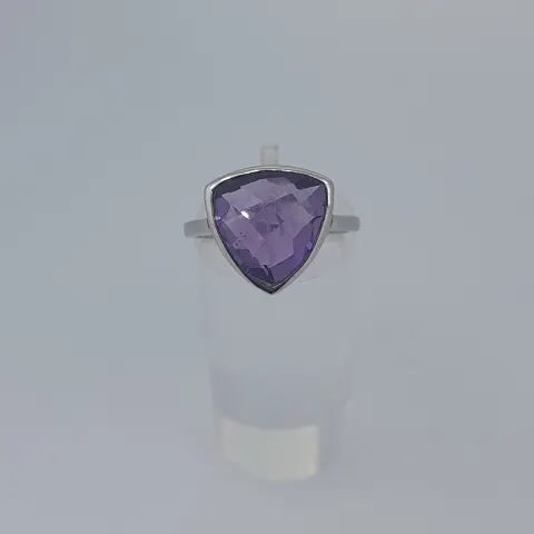 Silver ring set with natural amethyst faceted stone