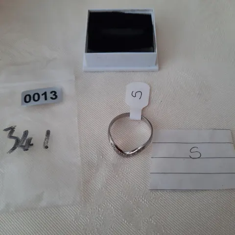 Rhodium plated set high quality CZ ring.  Size S. Code 341/013