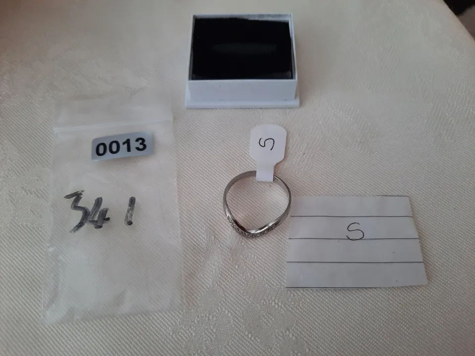 Rhodium plated set high quality CZ ring.  Size S. Code 341/013
