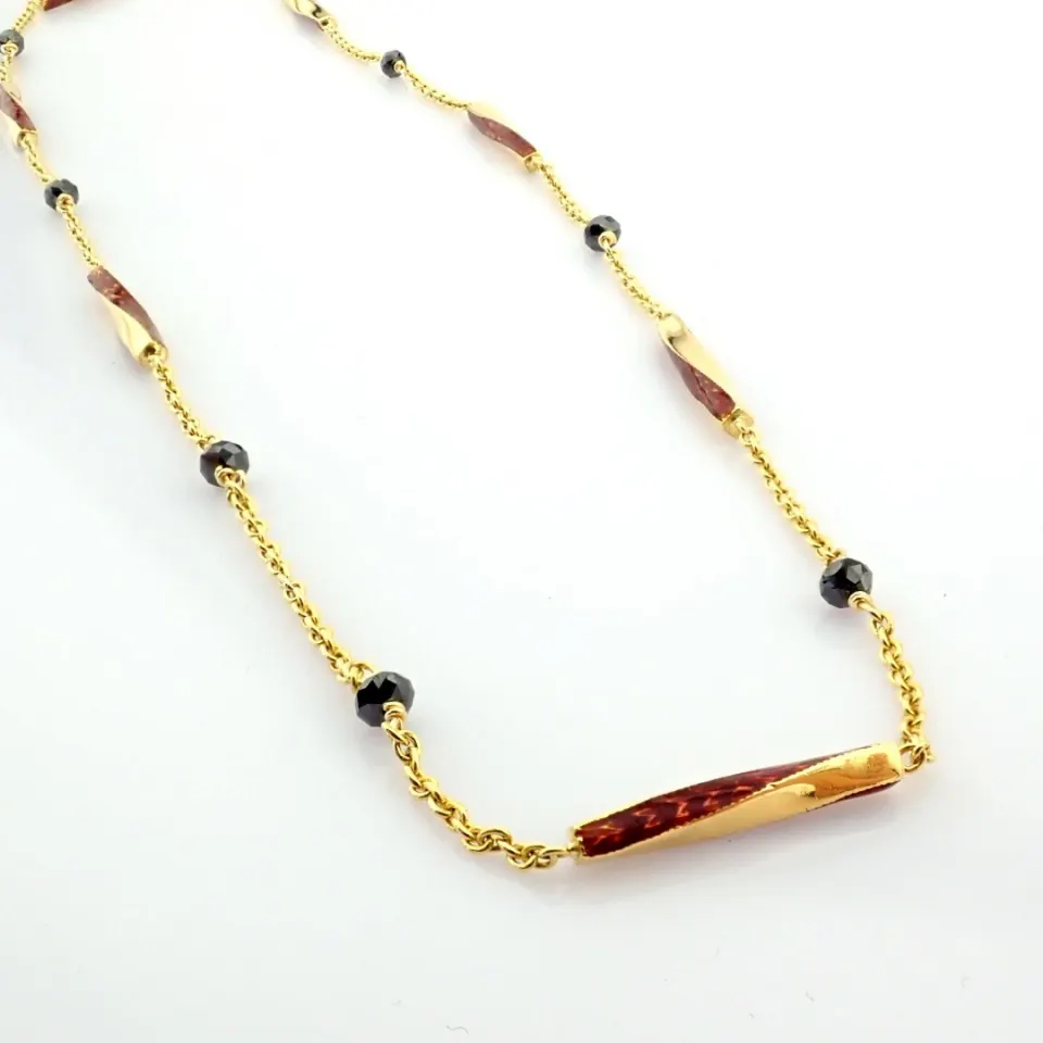 18K yellow gold necklace detailed with enamel parts and beads diamonds