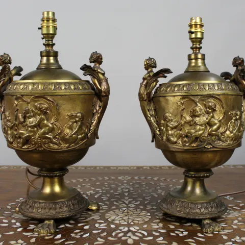 Pair of French Gilt Bronze Urn Lamps with Putti Reliefs, circa 1900