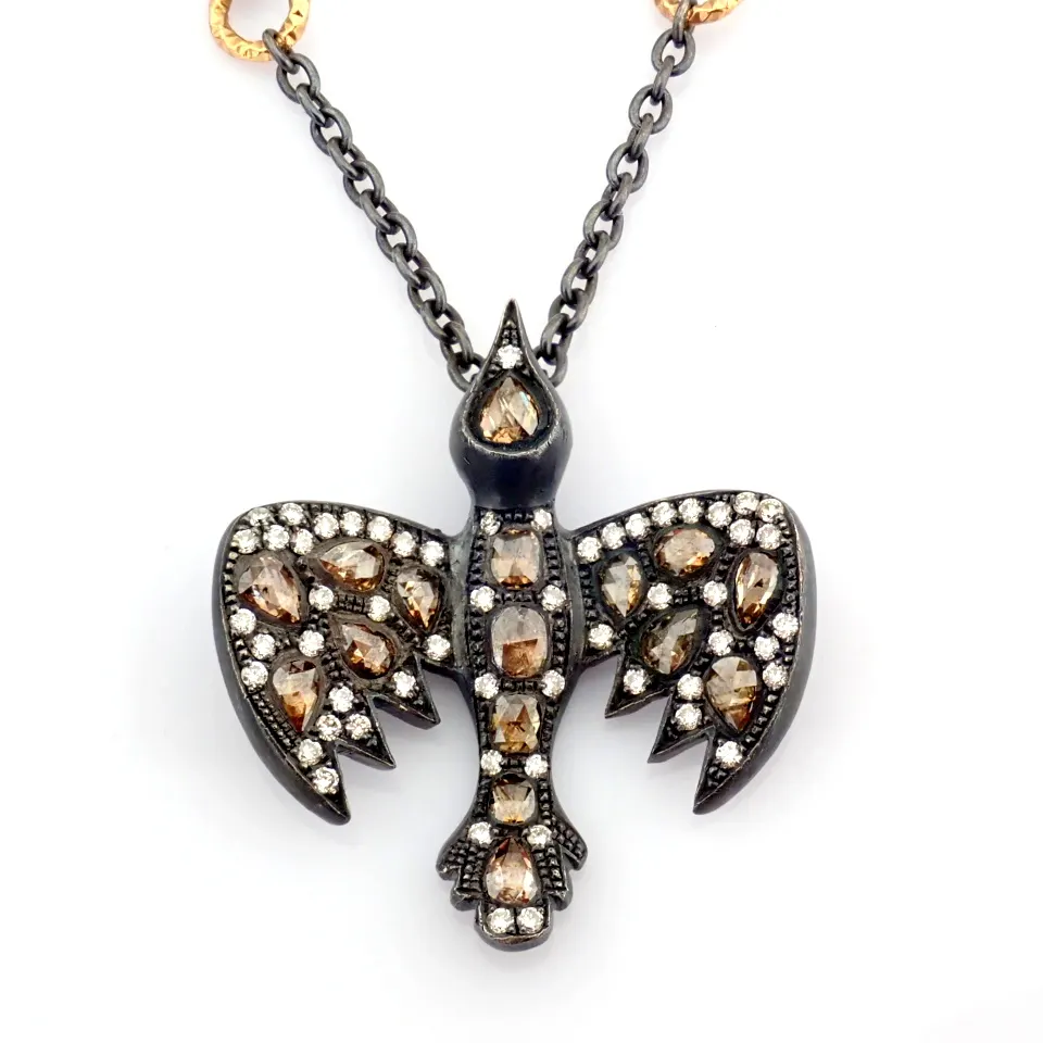 An Exquisite Bird Necklace Detailed With Brilliant Diamonds and Gold On Silver