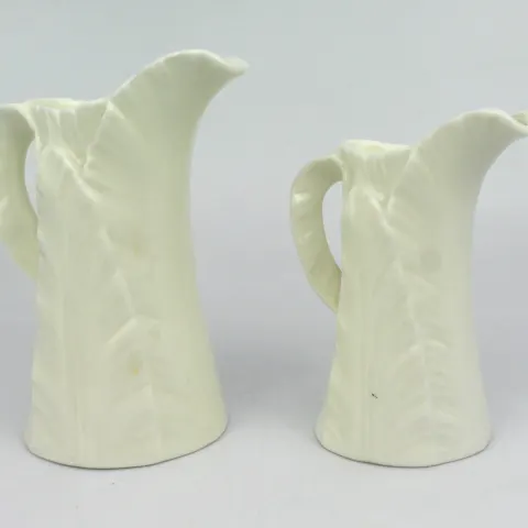 Pair of Royal Worcester Leaf Jugs