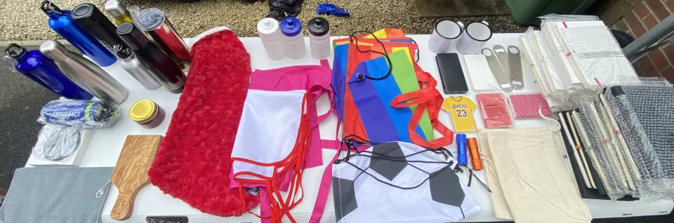 Box of Assorted Drinkware, Power banks, Diaries