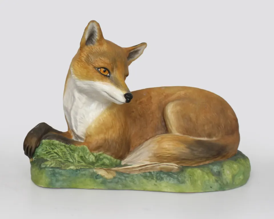 Pair of English Hand Painted Ceramic Fox Sculptures