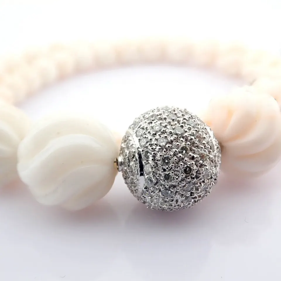 An Exquisite Coral Necklace Detailed With Brilliant Diamonds and Gold