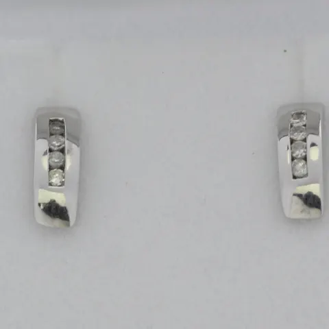 9ct White Gold Three Stone Diamond Earring 0.10