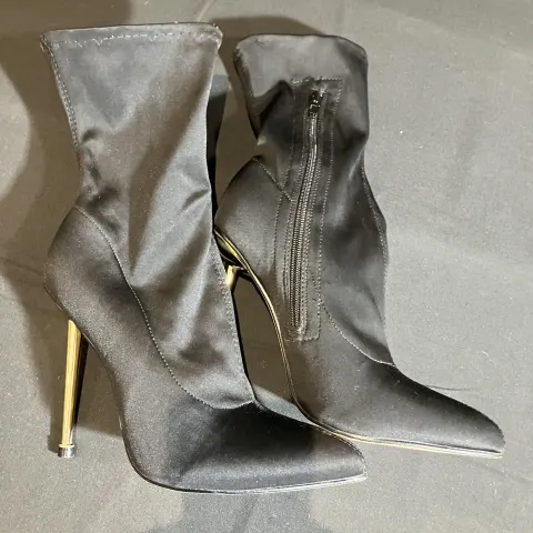 Ego ankle boots worn by body double