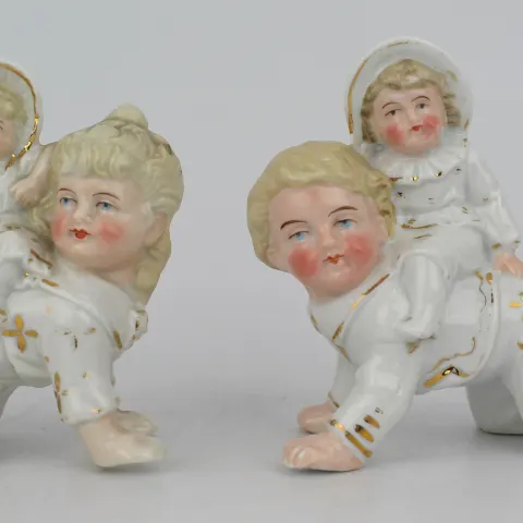 Pair of English Victorian Piano Baby Figurines